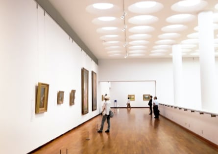 Gallery hall with paintings on the walls